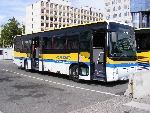 Un Irisbus Arès de Faure (en livrée Transisère) stationne portes ouvertes à la gare routière autocars de Part Dieu Villette